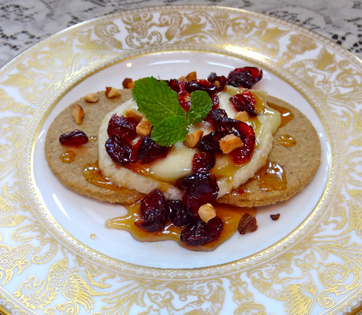 Baked Goat Cheese with Dried Cranberries and Honey Jamie Geller